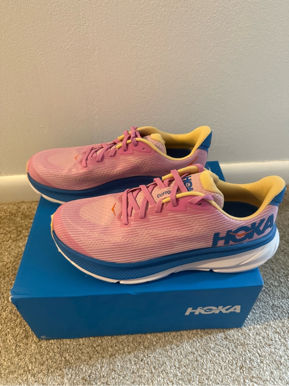 Hoka Women's Running Shoes in Pink with Blue and Yellow Accents